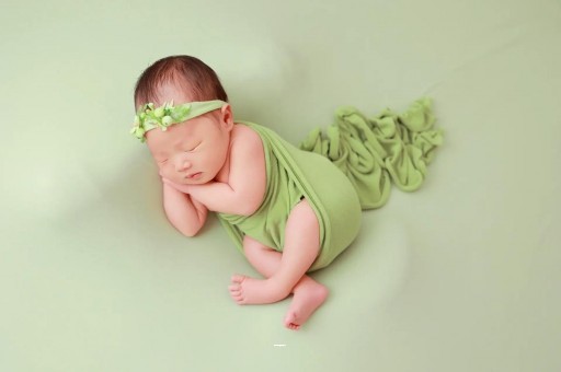 国内人工代生孩子咳嗽吐奶但不发烧